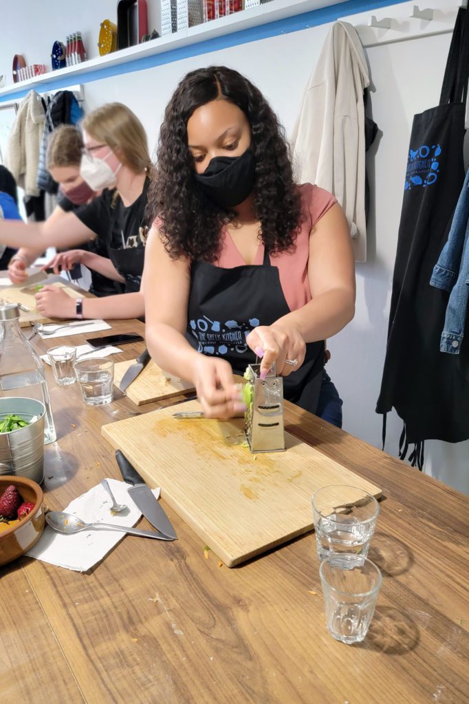 This is an image of T from Sundays at T's in a cooking class in Greece. Read more about gluten-free foods and dining tips. 