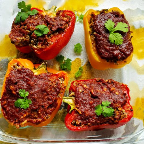 This is a Pinterest image of the stuffed bell peppers from Sundays at T's.