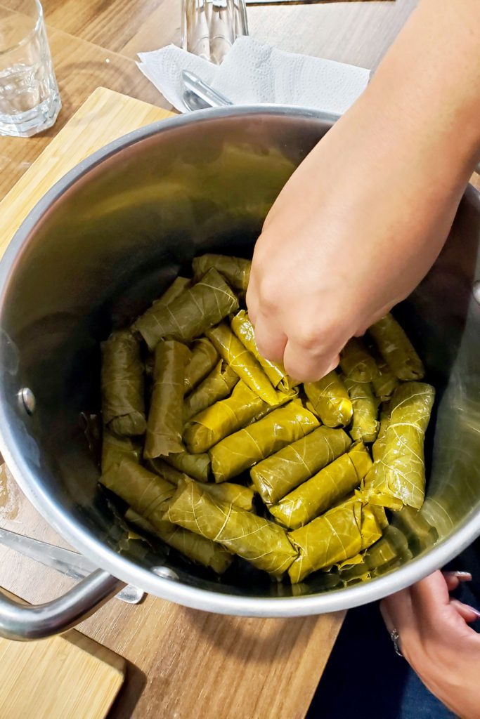 Traveling and food in Greece. Dolmades in the pot ready to boil. Enjoying great food while traveling in Greece. 