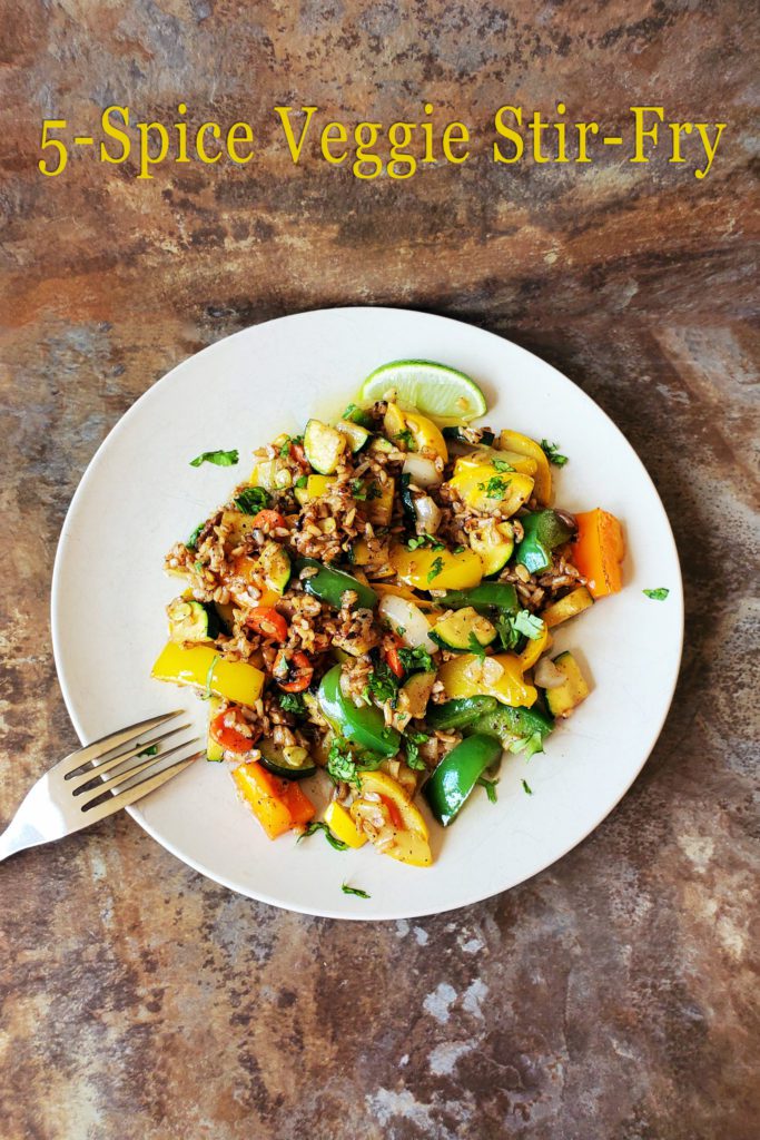 This is an image of the 5-Spice Veggie Stir Fry on a textured background.