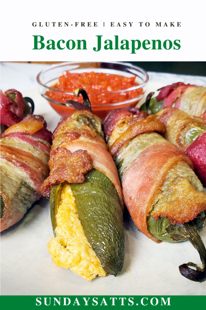 This is a Pinterest image of stuffed bacon jalapenos from Sundays at T's. These jalapeno poppers are stuffed with three cheeses (cream cheese, pepper jack cheese, and cheddar cheese), paprika, and garlic.