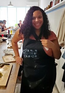 This is an image of T from Sundays at T's in a cooking class in Greece learning how to make gluten-free Greek Foods. Read more about T and gluten-free recipes and dining tips.