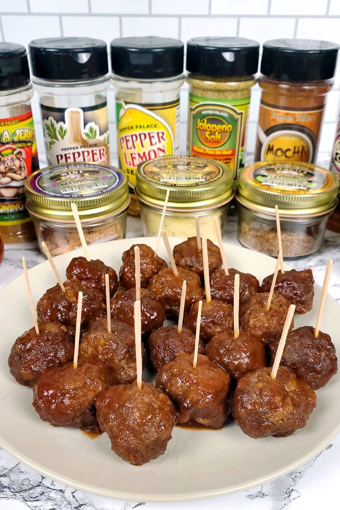 This is an image of the mango BBQ meatballs with mango BBQ sauce from Pepper Palace. A simple gluten-free appetizer from Sundays at T's. This image also includes other products from Pepper Palace.