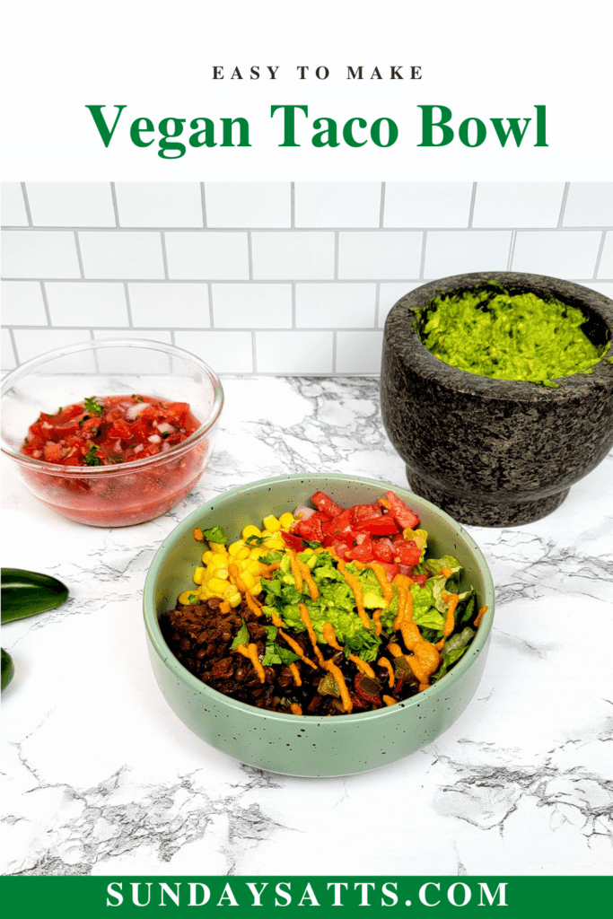 This is a Pinterest image of the vegan taco bowl with the lentil taco "meat", black beans, lettuce, corn, guacamole, salsa, and chipotle aioli.
