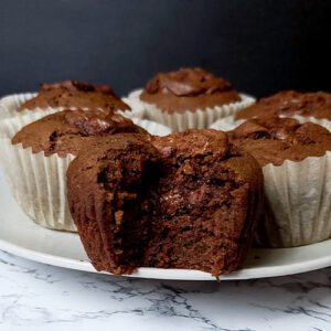 This is an image of the chocolate banana and Nutella muffins from Sundays at T's. The image shows the inside of the muffins with the Nutella oozing out.