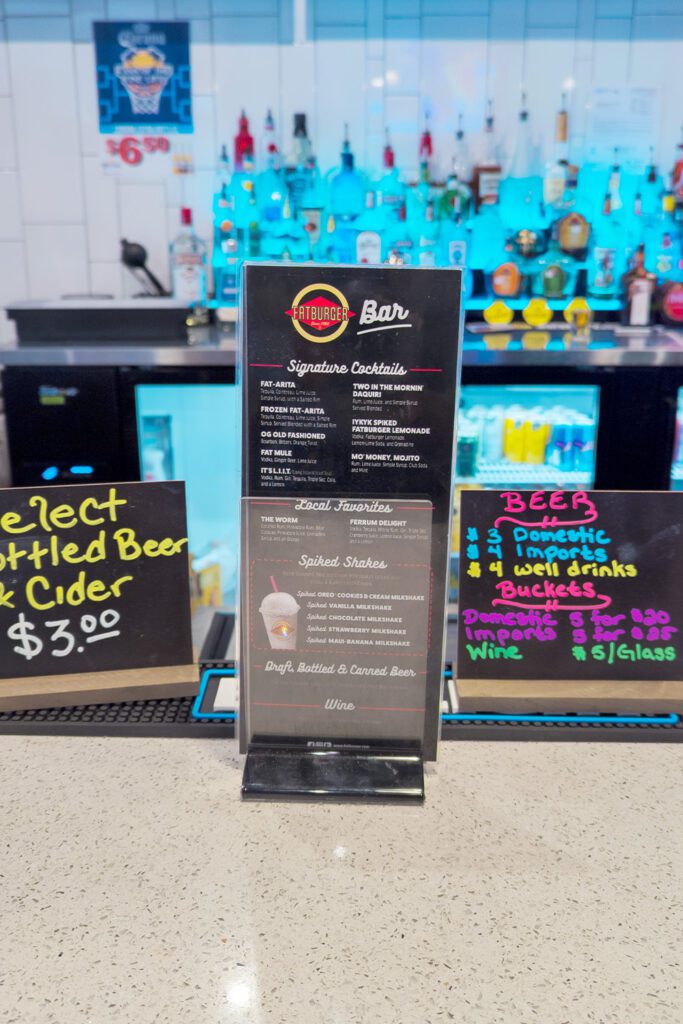 This is an image of the bar menu with the full bar in the background at Fatburger and Buffalo's Express in Manassas, Virginia.