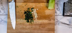 This is an image of the fresh herbs and minced garlic for the Greek tzatziki.