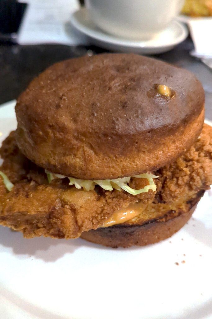 This is an image of Cafe Avalaun's gluten-free Nashville Hot Chicken Sandwich.