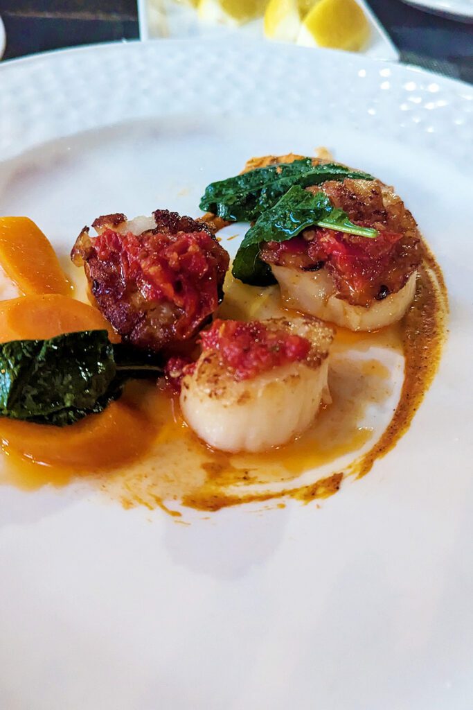 This is an image of the pan-seared scallops from Dante Tremont in Cleveland, Ohio.