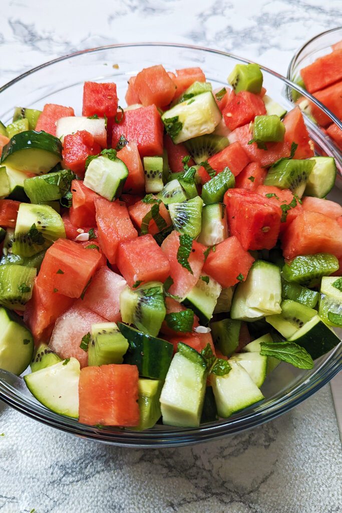 This is an image of the watermelon, cucumber, and kiwi salad garnished with fresh mint from Sundays at T's.