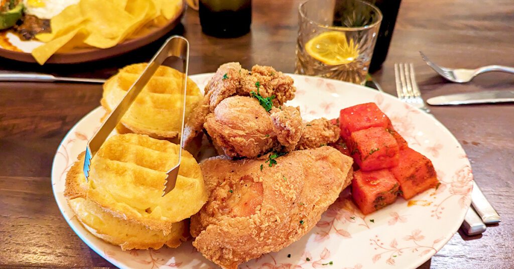 This is an image of the gluten-free fried chicken and waffles from Yardbird Table & Bar in Washington, DC.