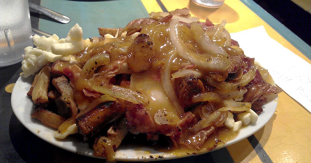 This is an image of poutine taken at one of many restaurants in Montreal, Quebec, Canada.