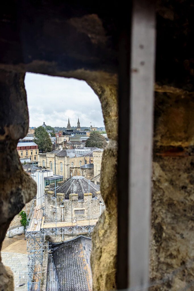 This is an image of Oxford's skyline from the only surviving window at the Oxford Castle & Prison. This photo was taken by T during her study abroad program at the University of Oxford.